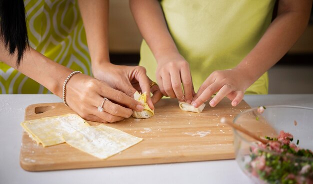 Close up hands preparing food