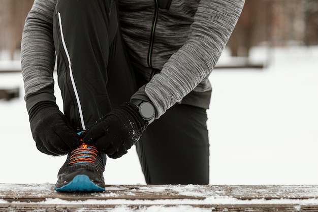 Close-up hands tying shoelaces