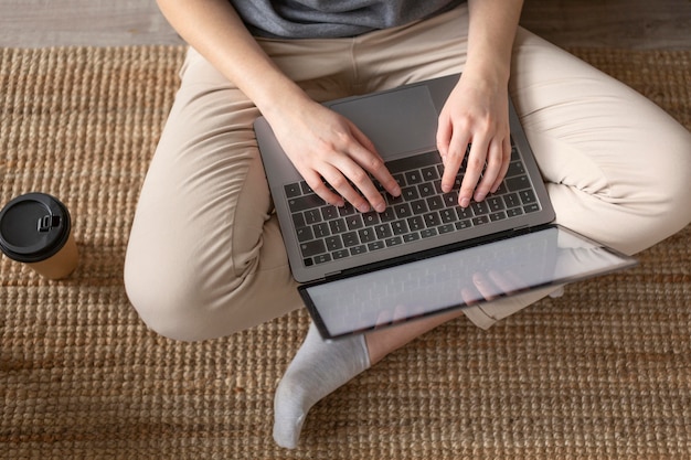 Free photo close up hands typing on keyboard