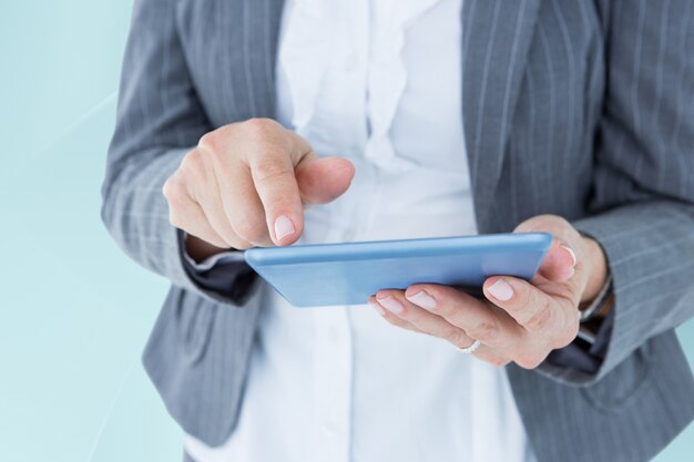 Close-up of hands using a tablet