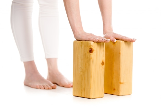 Free photo close-up of hands on wooden blocks