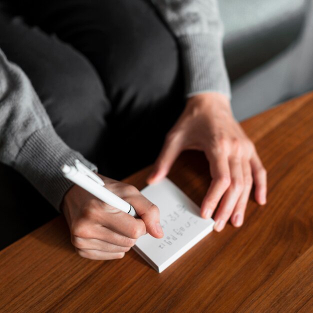 Close-up hands writing japanese message