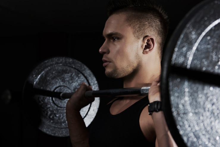 Free Photo close up on handsome young man working out