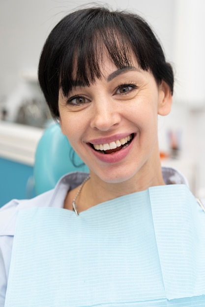 Close up on happy client in dental clinic