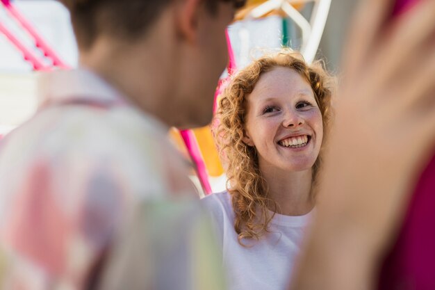 Close-up happy couple at carnival