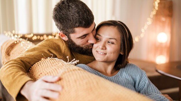 Close-up happy couple in living room