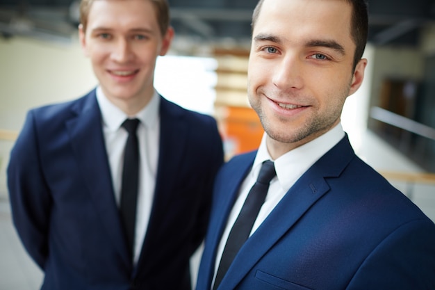 Close-up of happy executives