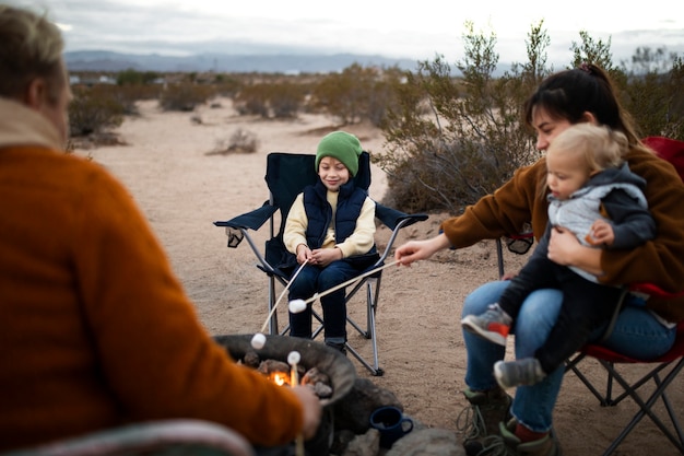 Free photo close up happy family in american desert