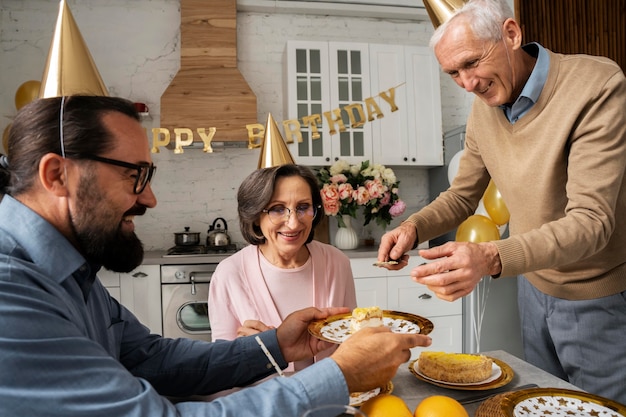 Free photo close up happy family with cake