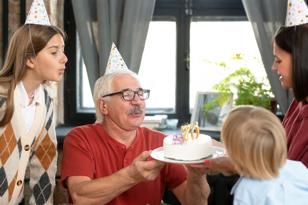 Close up happy family with cake