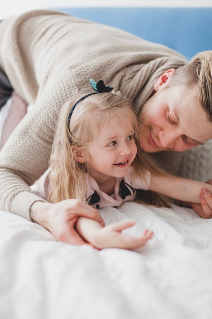 Close-up of happy father and daughter