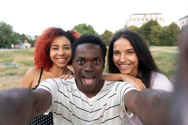 Close up happy friends posing together