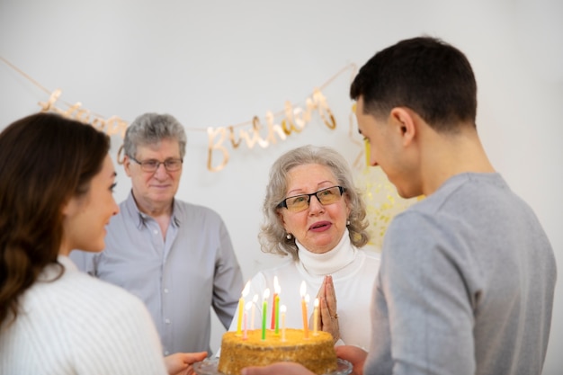 Close up happy people celebrating birthday