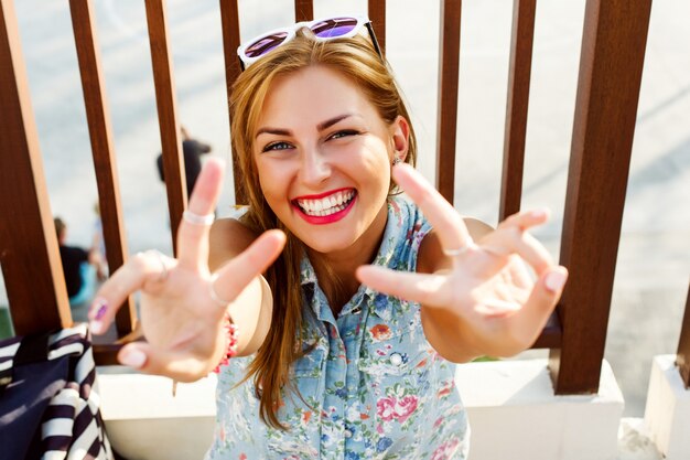 Close-up of happy teenager showing her white teeth