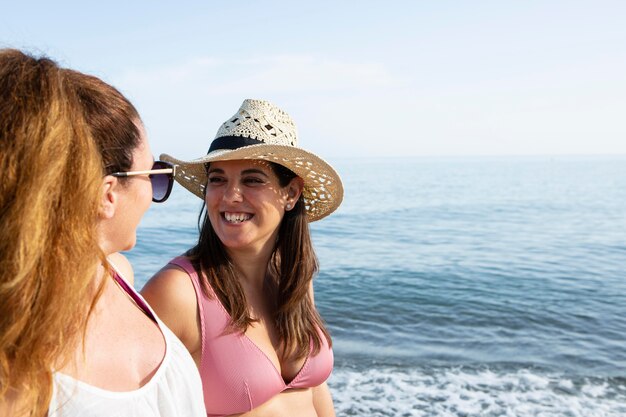 Close up happy women at seaside