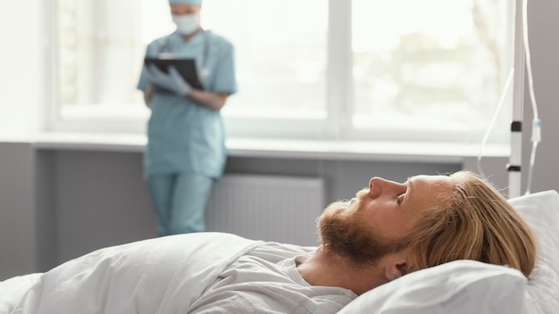 Free photo close up health worker supervising patient