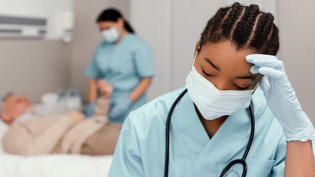 Close up health workers with mask