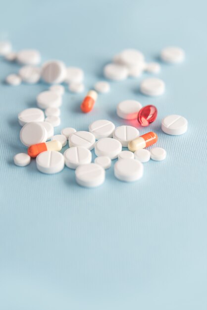 Close up of a heap of white tablets