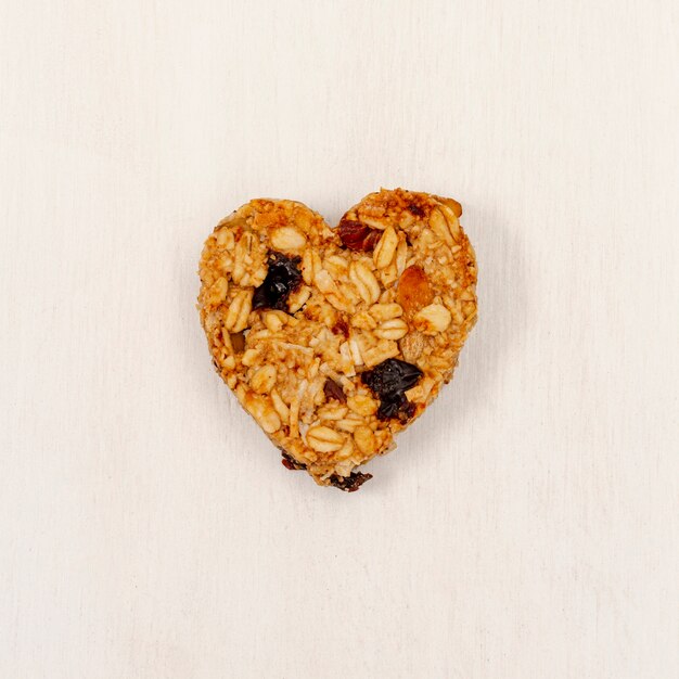 Close-up heart shape cereal with raisin