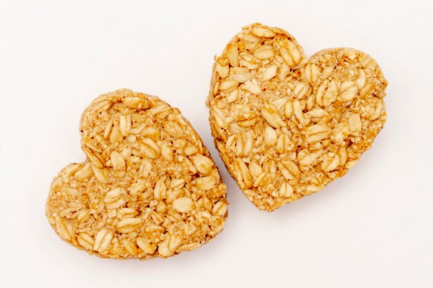 Close-up heart shaped cereal on white background