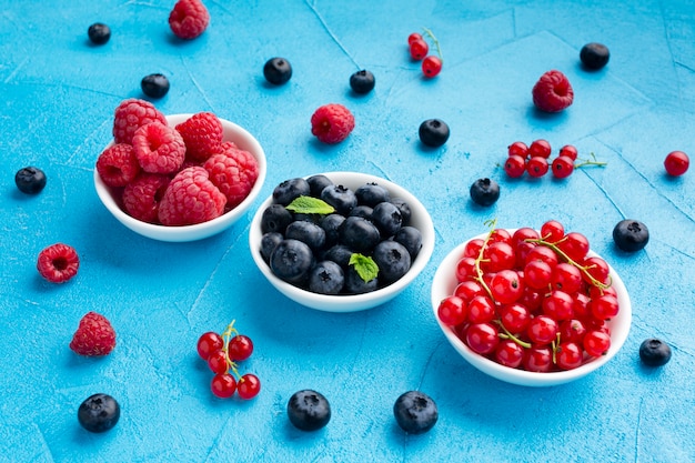 Close-up high angle view of bowls of berries