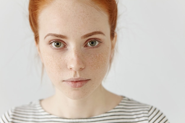 Close up highly-detailed portrait of amazing charming young European woman with ginger hair