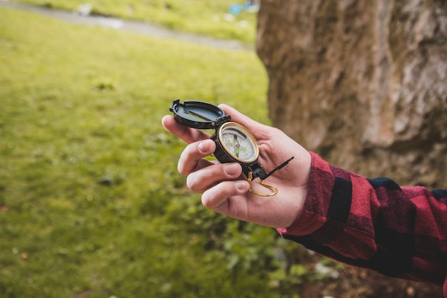 Free photo close-up of hiker with compass