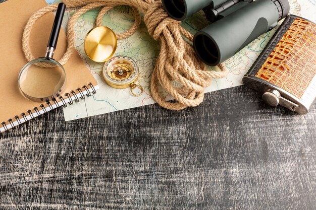 Close-up hip flask and binoculars