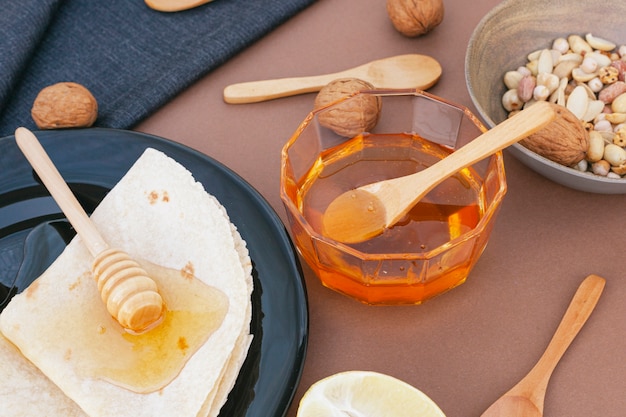 Close-up homemade honey with tortillas