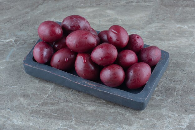 Close up Homemade pickle olives in white bowl