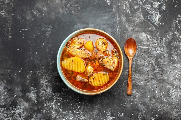 Close up on homemade soup with chicken and spices set