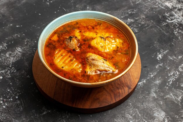 Close up on homemade soup with chicken and spices set