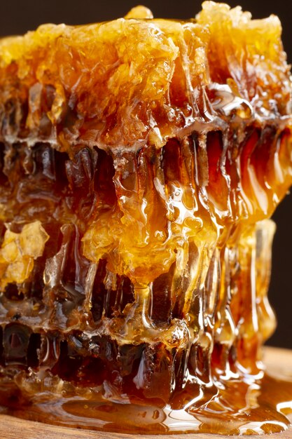 Close-up of honeycomb with honey and beeswax