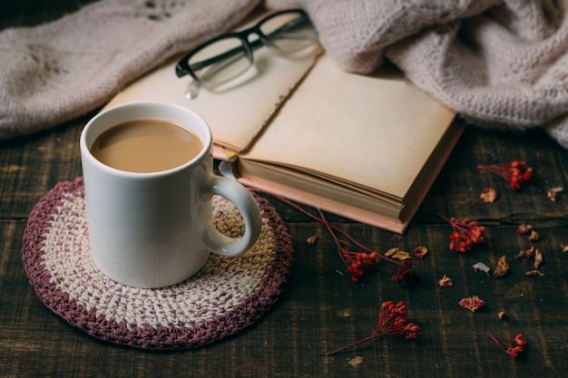 Close-up hot chocolate with a book