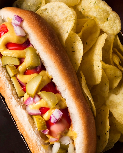 Free photo close-up hot-dog with chips