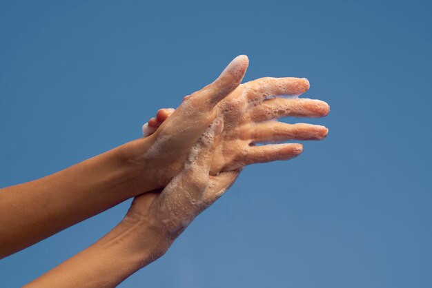 Free photo close up on hygienic hand washing