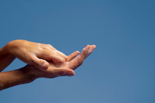 Free photo close up on hygienic hand washing