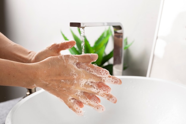 Free photo close up on hygienic hand washing