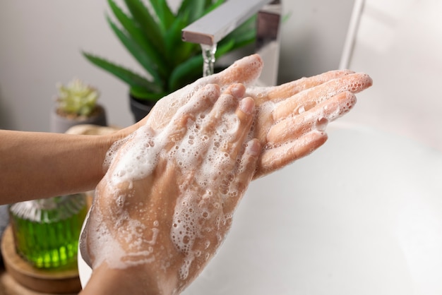 Free photo close up on hygienic hand washing