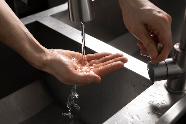 Free photo close up on hygienic hand washing