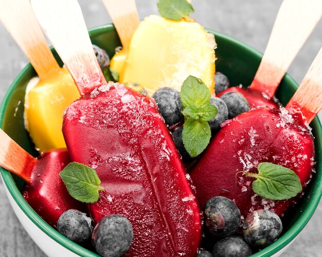 Close-up ice creams with fruits