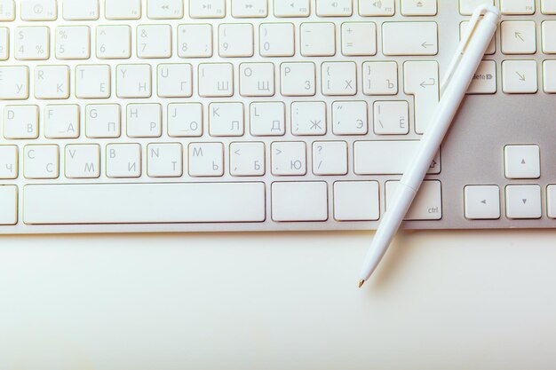 Close up image of computer office keyboard on a white background