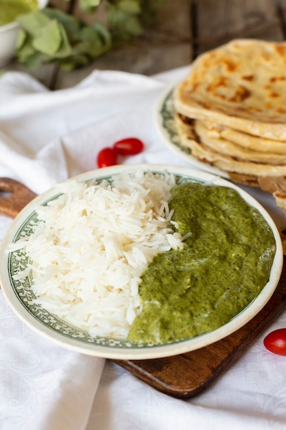 Close-up indian food with rice and pita