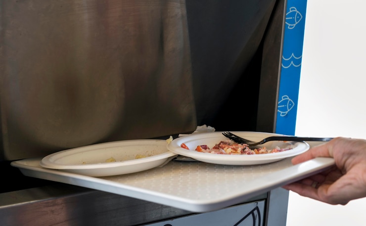 Free Photo close-up individual throwing away food leftovers