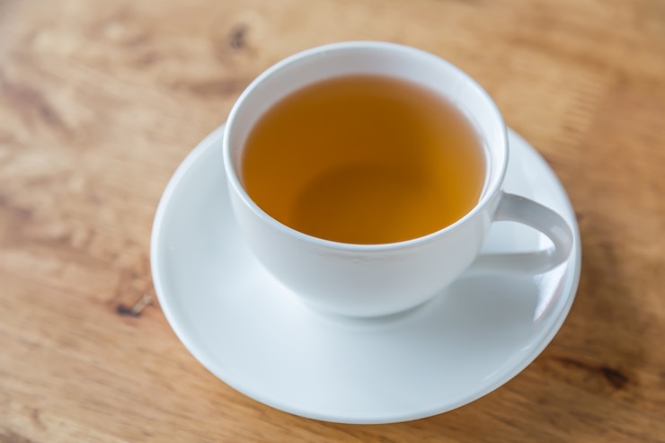 Free Photo close-up of infusion in white cup