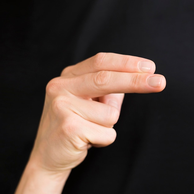 Free photo close-up interpreter teaching sign language