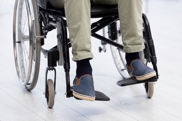 Close-up invalid man in wheelchair