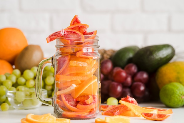 Close-up jar filled with grapefruit slices