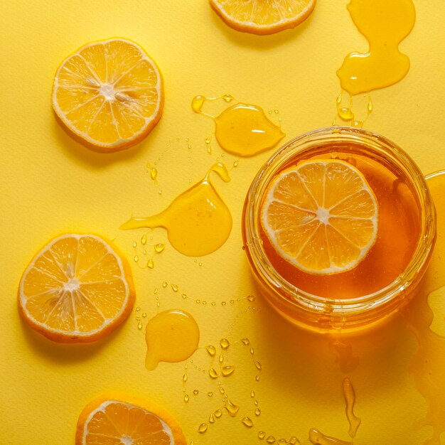 Close-up jar with honey and lemon