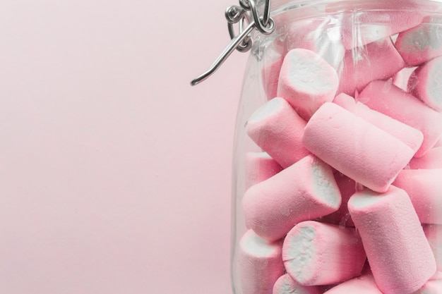 Free photo close-up jar with marshmallows